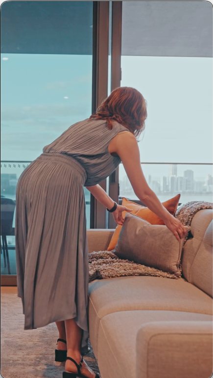 Lisa Loke styling cushions to present a home