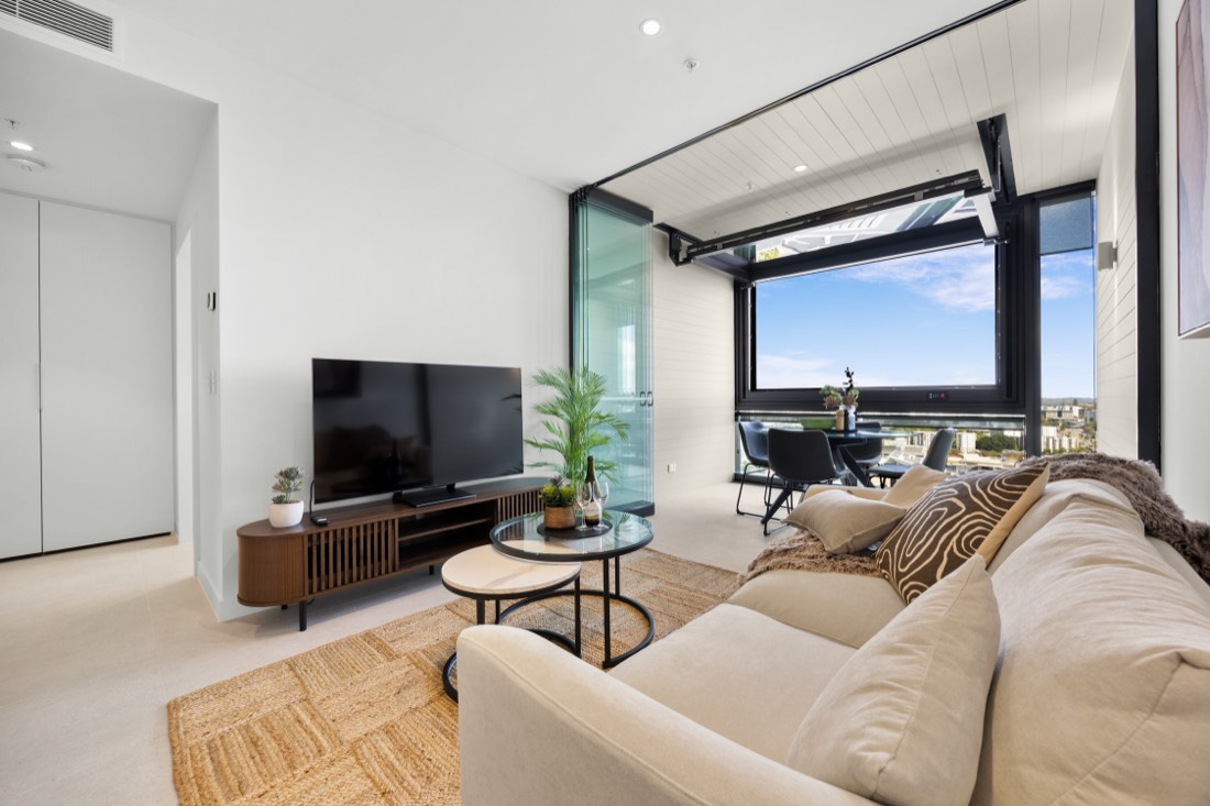 Living area in apartment 2405, looking out to the balcony